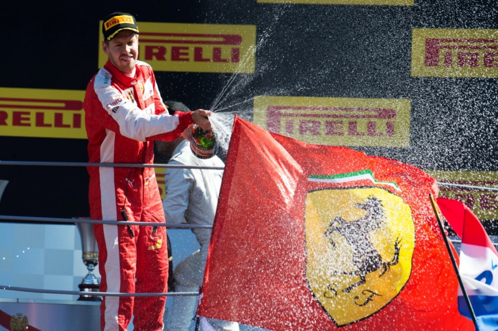 Formula One World Championship 2015, Round 12, Italian Grand Prix, Monza, Italy, Sunday 6 September 2015 - Sebastian Vettel (GER) Ferrari celebrates his second position on the podium.